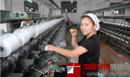 新疆纺织企业守着“棉花堆” 难过“寒冬”